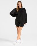 Signature Oversized Sweater Schwarz mit hoher Tai